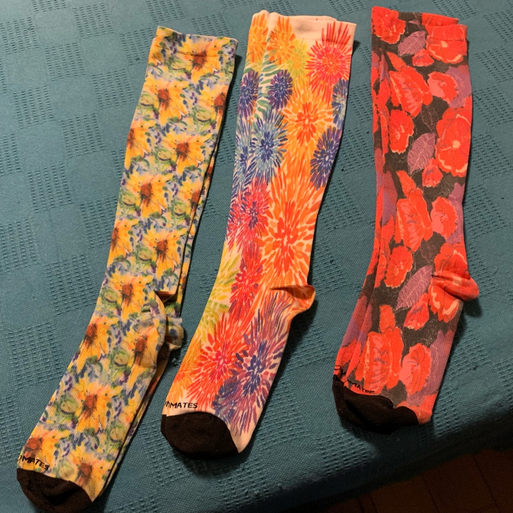 Three pairs of Nurse Mates medium compression socks